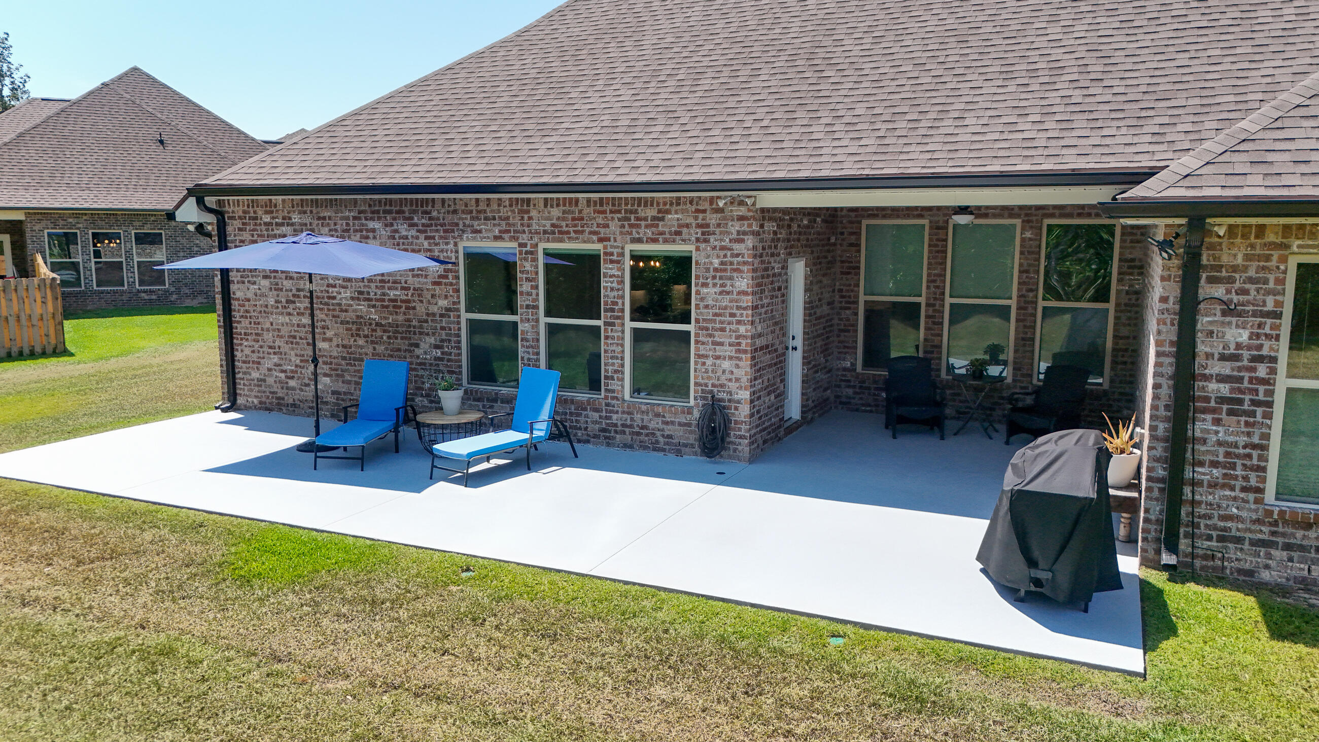 115 Flora Lane Freeport, FL 32439 - Photo 63 of 69 a view of a house with backyard porch and sitting area