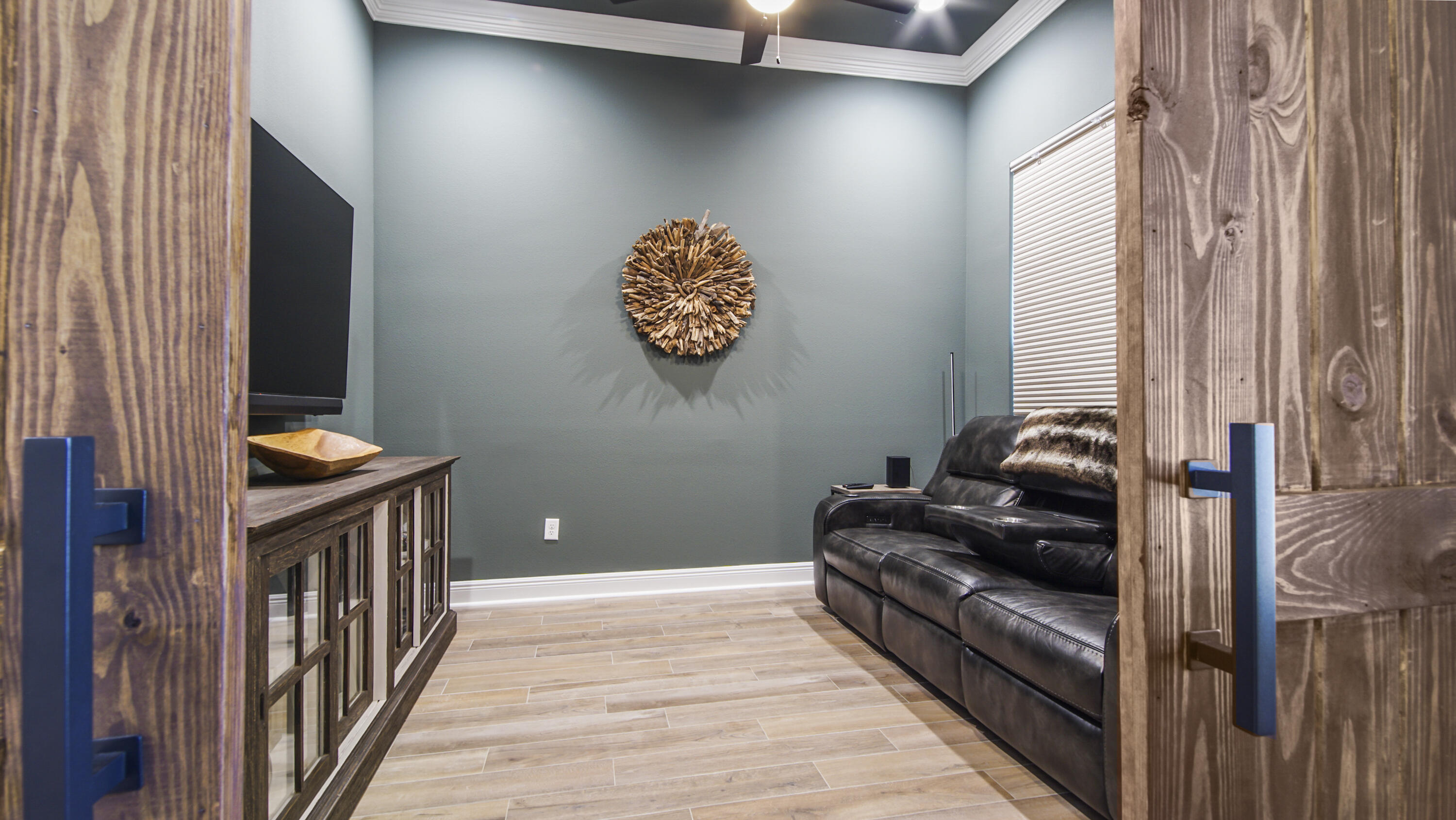 115 Flora Lane Freeport, FL 32439 - Photo 7 of 69 a view of a hallway with entryway a wooden floor and front door