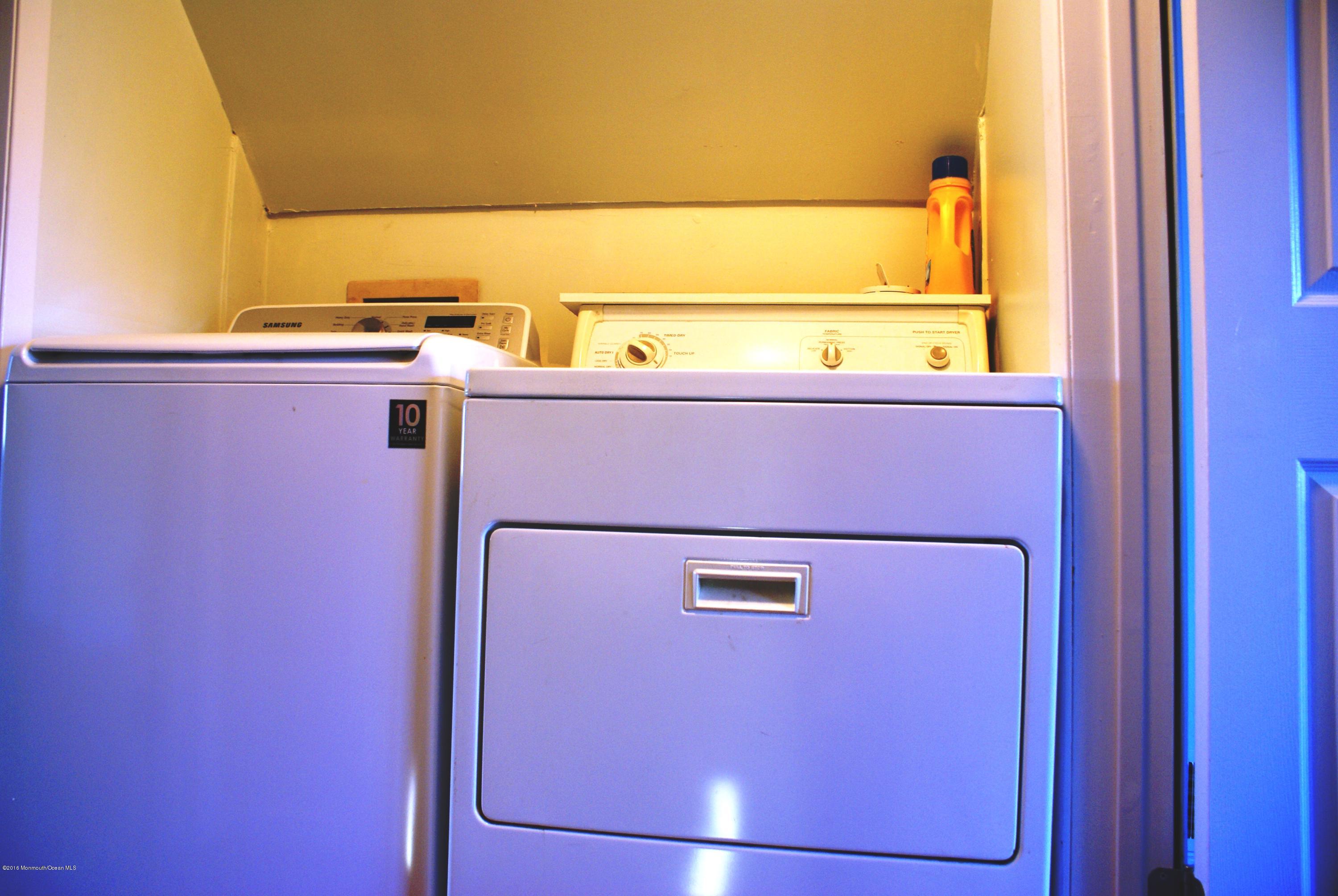 53 Tennent Road Morganville, NJ 07751 - Photo 10 of 11 a view of washer and dryer