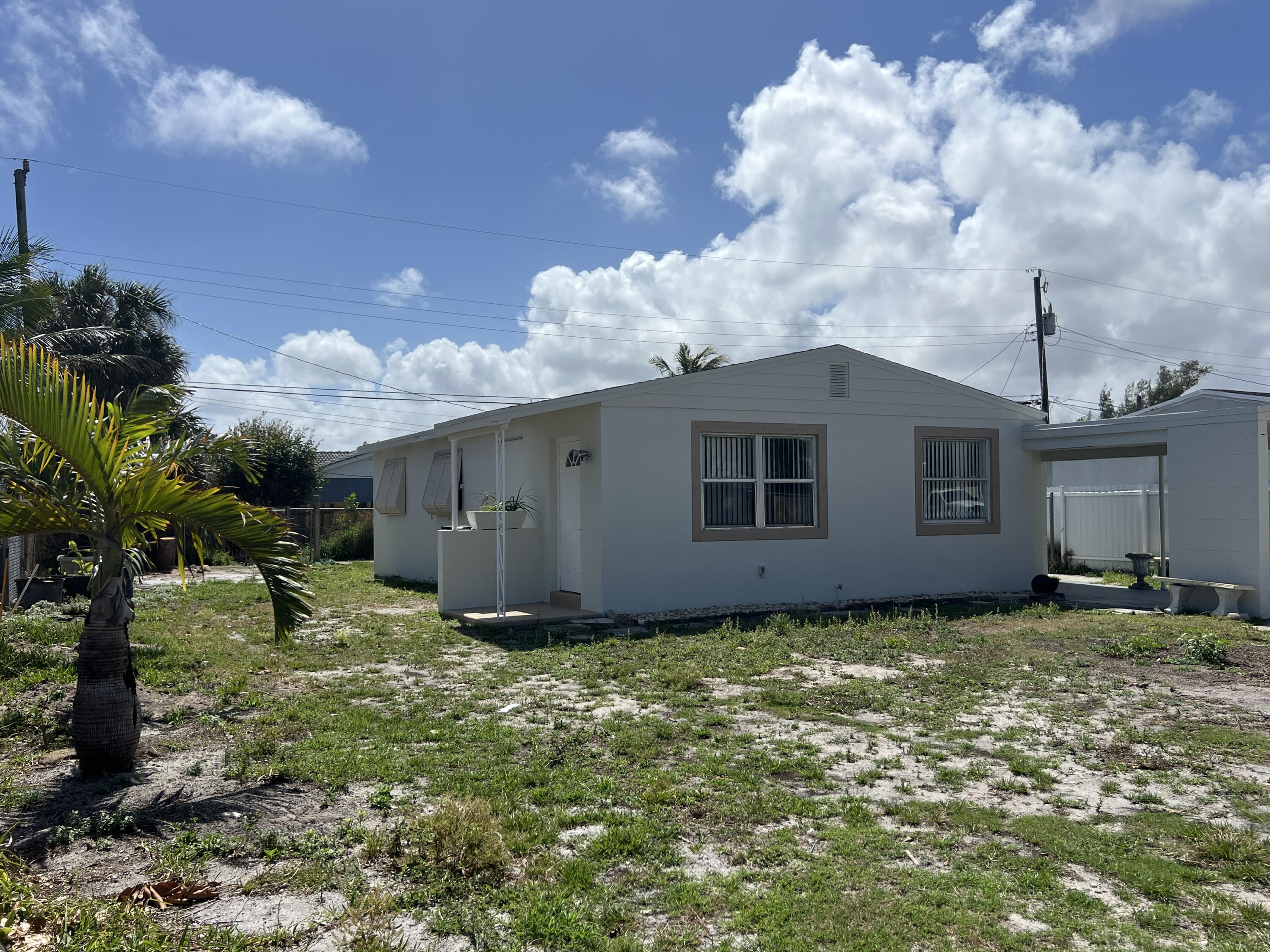 2012 Ardmore Road West Palm Beach, FL 33409 - Photo 14 of 18 East side of the house
