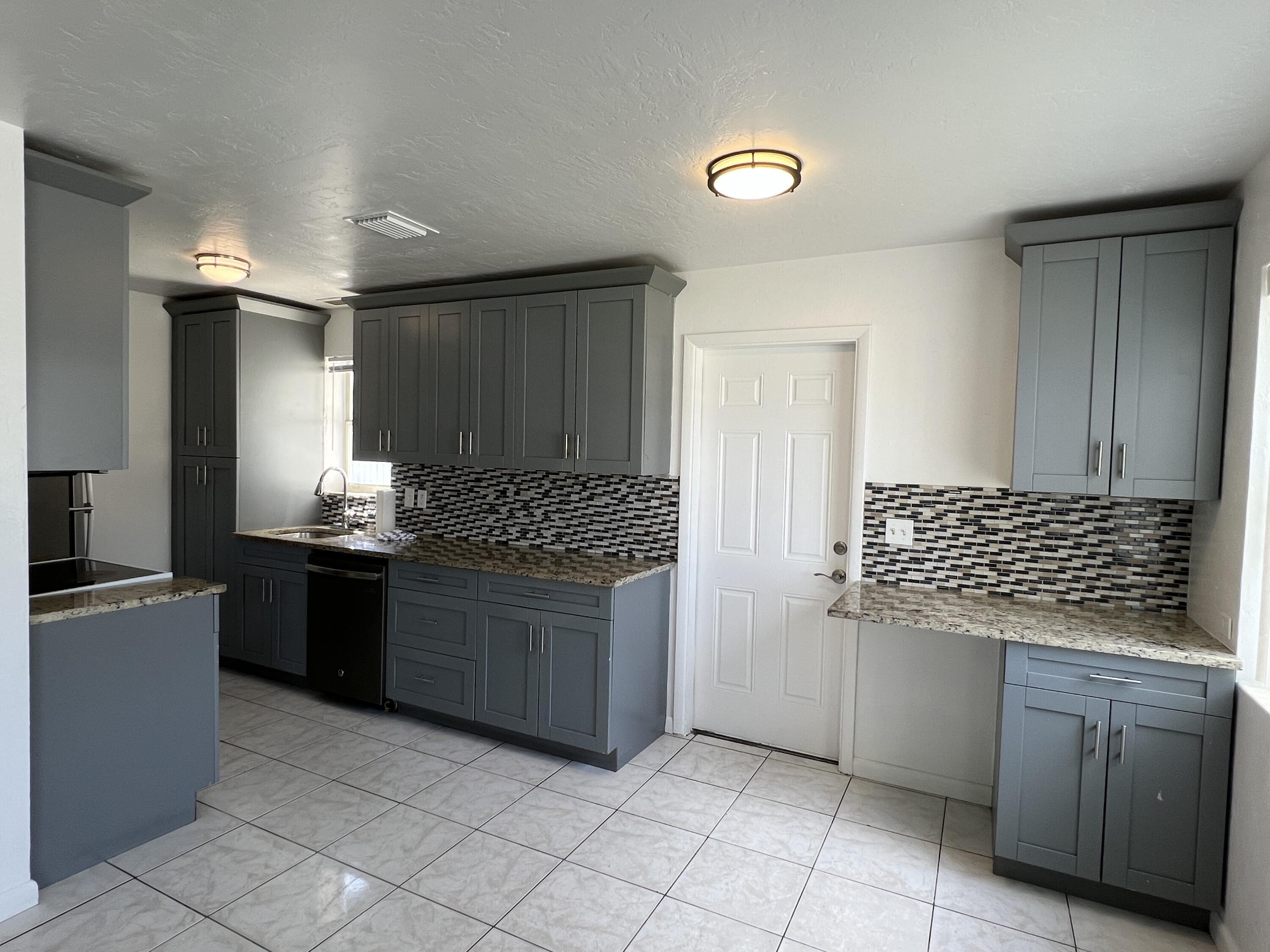 2012 Ardmore Road West Palm Beach, FL 33409 - Photo 2 of 18 New kitchen with extra cabinets & counte