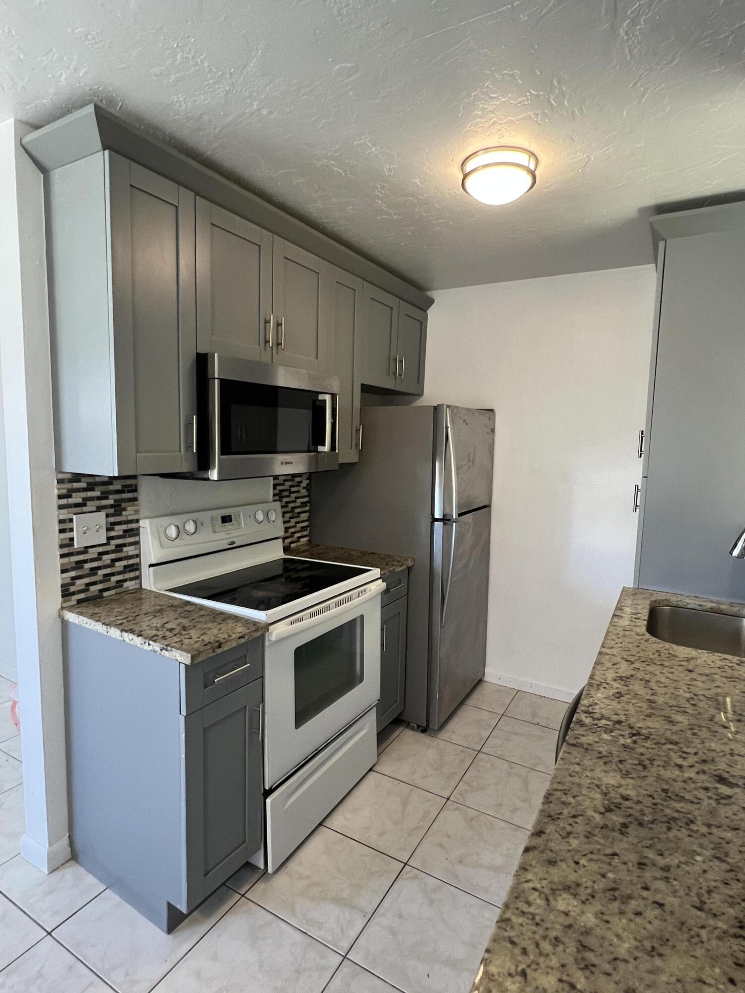 2012 Ardmore Road West Palm Beach, FL 33409 - Photo 3 of 18 New ktch cabinets and granite countertop