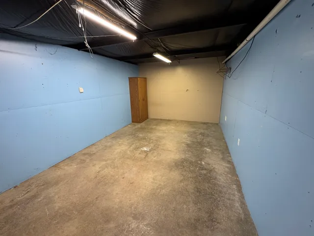 a living room with a couch and furniture