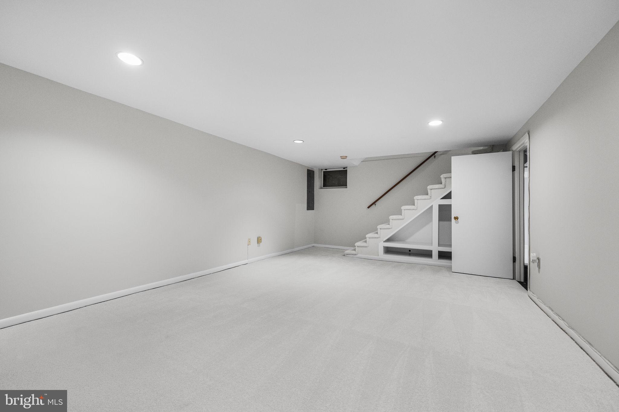 4923 34th Road North Arlington, VA 22207 - Photo 27 of 42 Spacious lower level recreation room