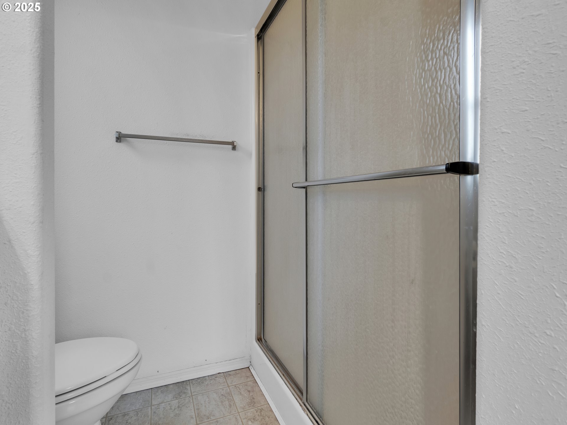 1005 Ferry Street, Unit 26 Dayton, OR 97114 - Photo 12 of 15 a bathroom with a granite countertop toilet and a sink