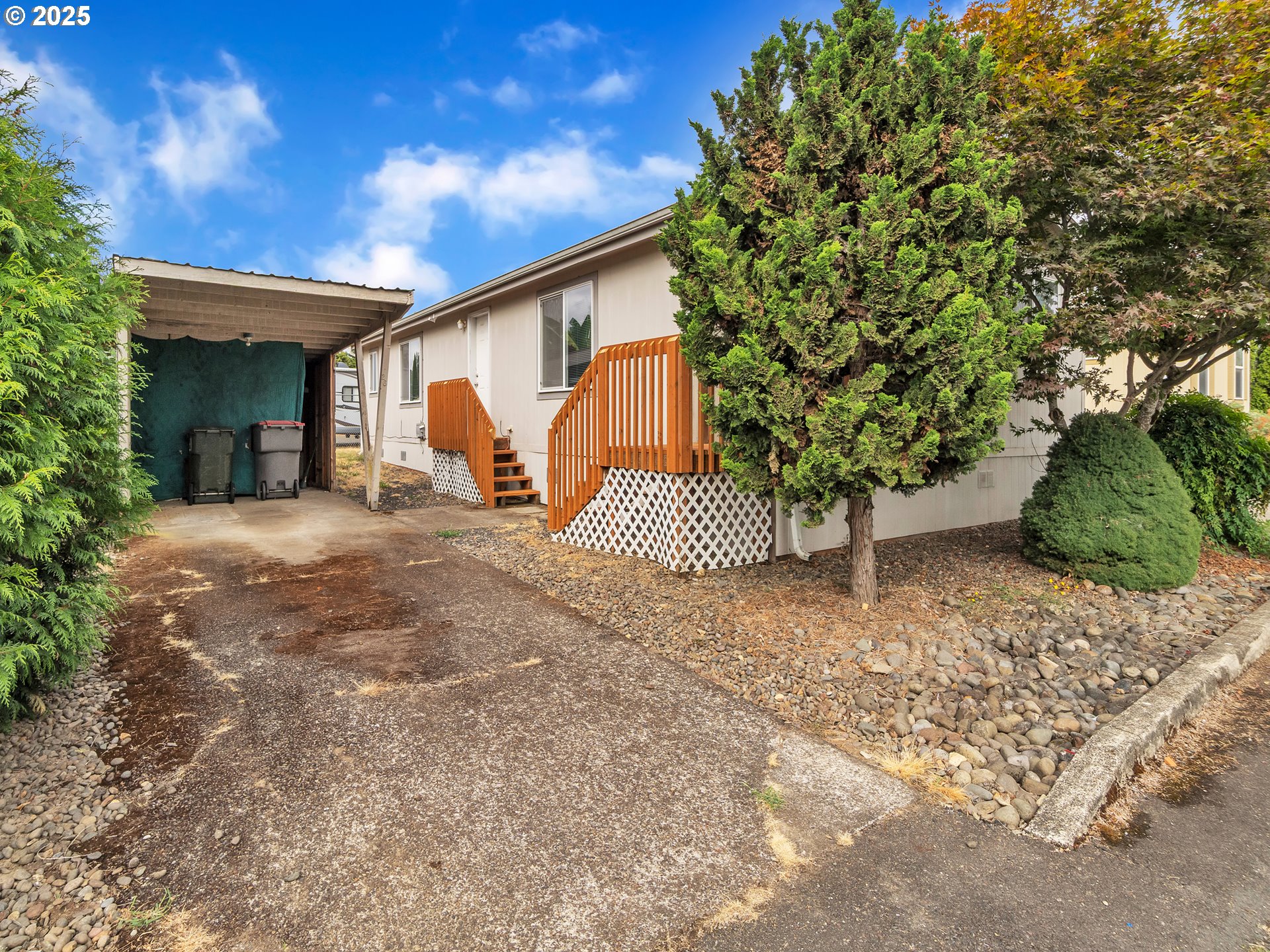 1005 Ferry Street, Unit 26 Dayton, OR 97114 - Photo 3 of 15 a view of a house with a yard
