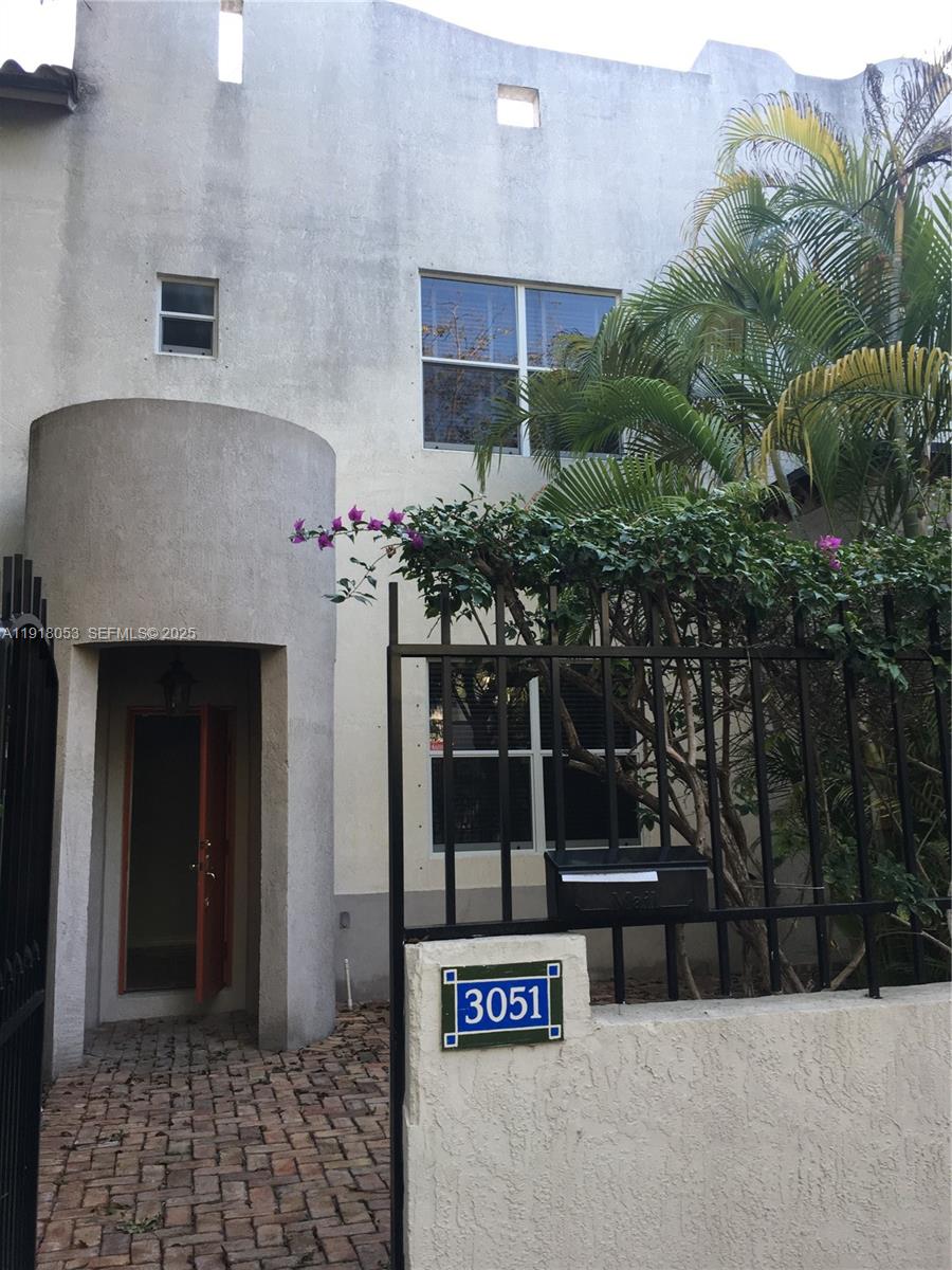3051 Center Street, Unit 9 Miami, FL 33133 - Photo 11 of 11 a view of a entryway door of the house