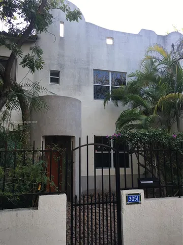 a sign that is on the side of a building