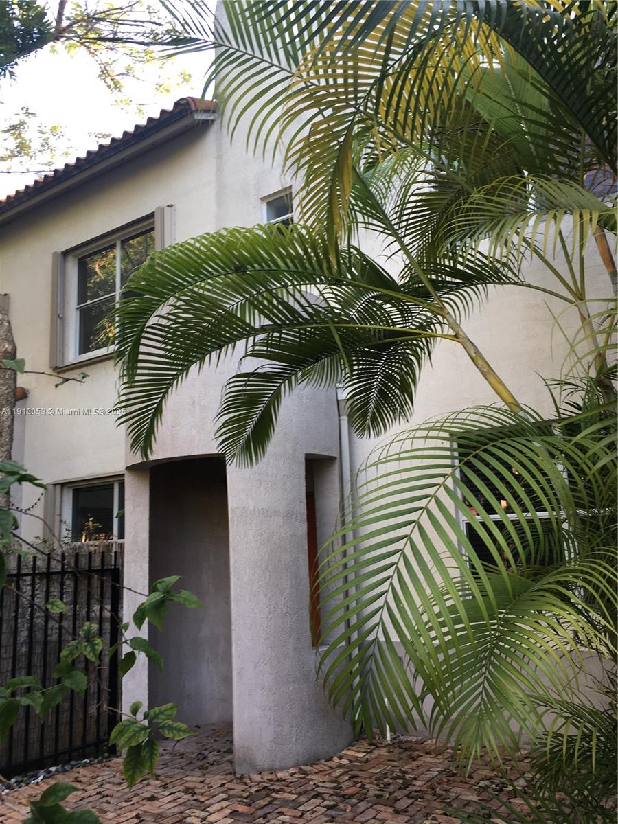 3051 Center Street, Unit 9 Miami, FL 33133 - Photo 3 of 11 a front view of a house