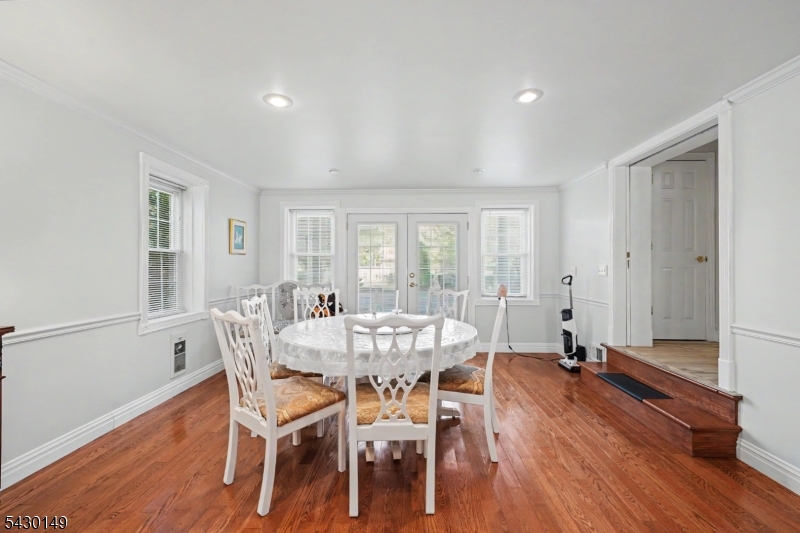 325 Matchaponix Road Old Bridge, NJ 08831 - Photo 13 of 21 a view of a dining room with furniture and wooden floor