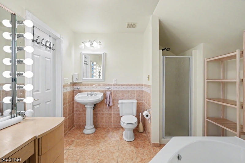 325 Matchaponix Road Old Bridge, NJ 08831 - Photo 18 of 21 a bathroom with a sink toilet and shower