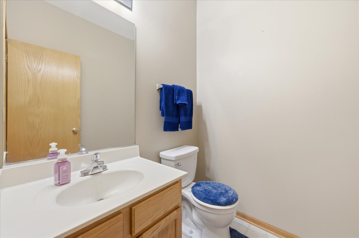 1916 Castle Ridge Drive Plainfield, IL 60586 - Photo 15 of 36 a bathroom with a sink and a toilet