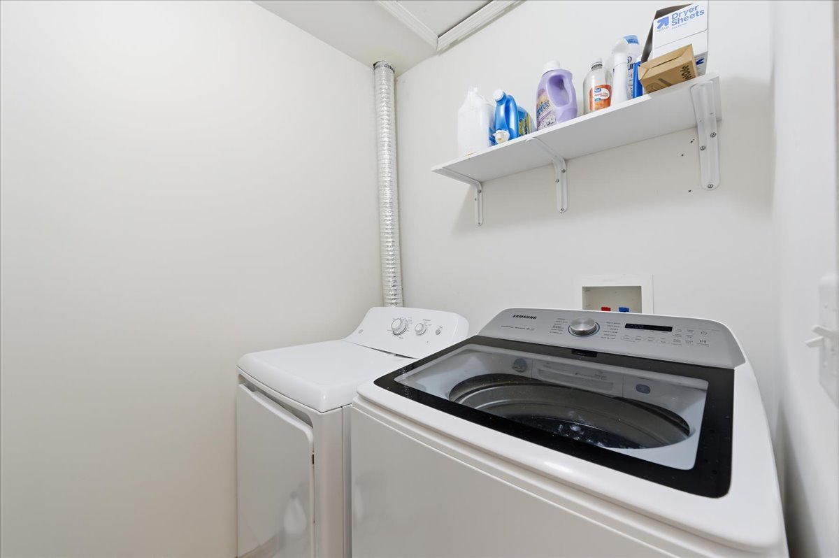 1916 Castle Ridge Drive Plainfield, IL 60586 - Photo 27 of 36 a utility room with dryer and washer