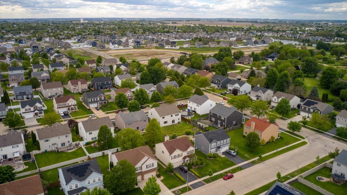 1916 Castle Ridge Drive Plainfield, IL 60586 - Photo 36 of 36 an aerial view of residential houses with outdoor space