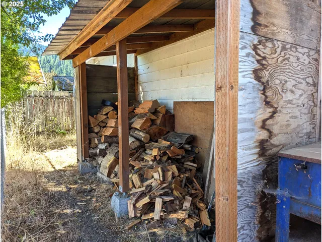 a kitchen with a sink cabinets and a window