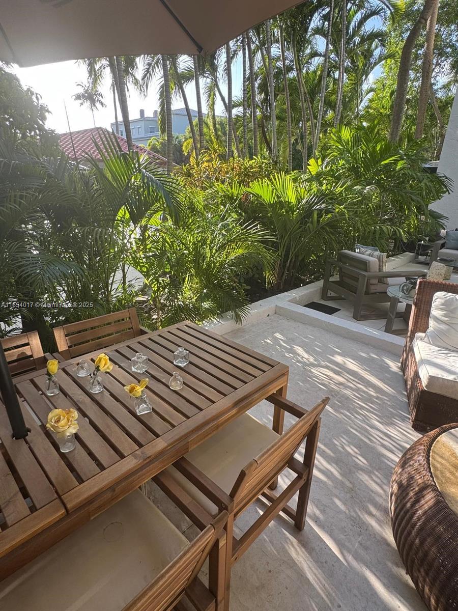 55 Ocean Ln Drive, Unit 1018 Key Biscayne, FL 33149 - Photo 30 of 36 a view of an outdoor space with seating