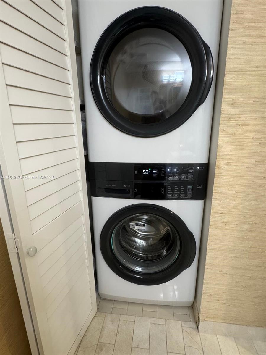 55 Ocean Ln Drive, Unit 1018 Key Biscayne, FL 33149 - Photo 3 of 36 a close up view of washer and dryer