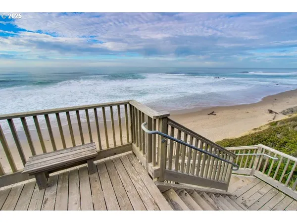 a view of deck with wooden floor and fence