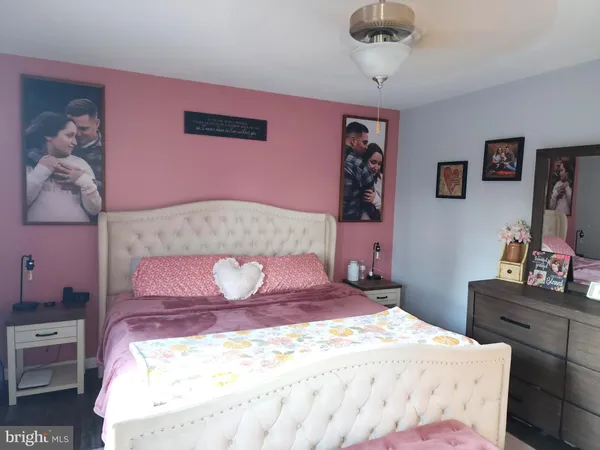 a room with a table and a mirror