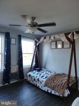 a bathroom with a sink toilet and mirror