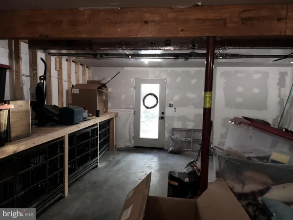 a bathroom with a sink and mirror