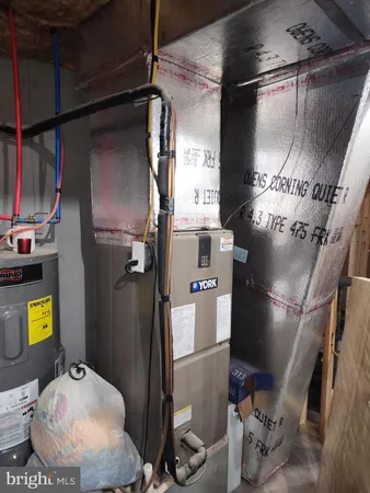 a front view of a house with large windows