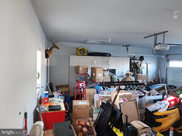 a backyard of a house with wooden deck