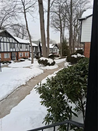 a view of street with parked cars