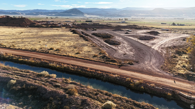 2600 Sevier Valley Canal Road Richfield, UT 84701 - Photo 7 of 63 Aerial view of sparsely populated area featuring a mountainous background