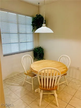 a table and chairs in a patio