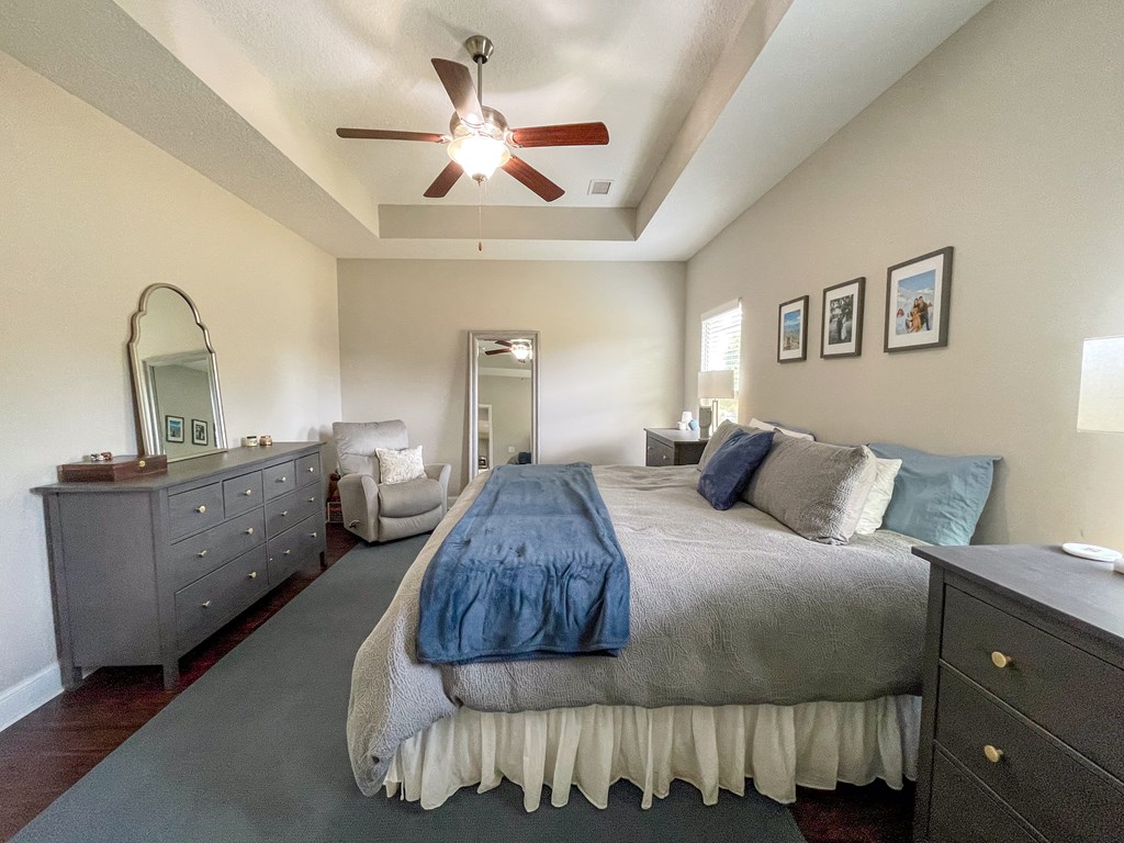 6 Cheyenne Trail Fort Mitchell, AL 36856 - Photo 15 of 33 a bedroom with a bed and a dresser