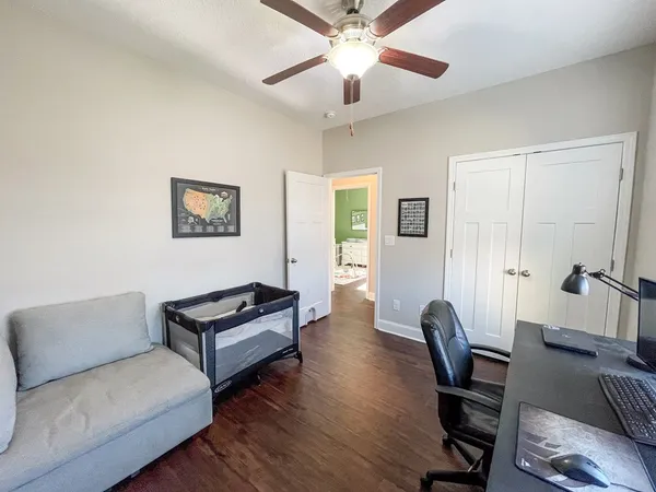 a living room with furniture and a window
