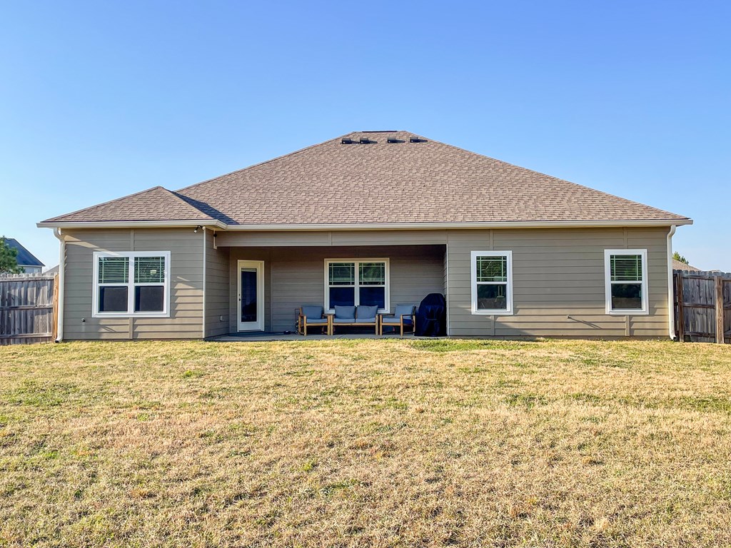 6 Cheyenne Trail Fort Mitchell, AL 36856 - Photo 28 of 33 a house view with a garden space
