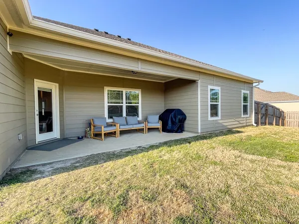 a house view with a outdoor space