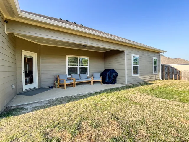 a house view with a outdoor space