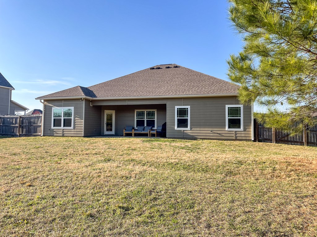6 Cheyenne Trail Fort Mitchell, AL 36856 - Photo 31 of 33 a front view of a house with a garden