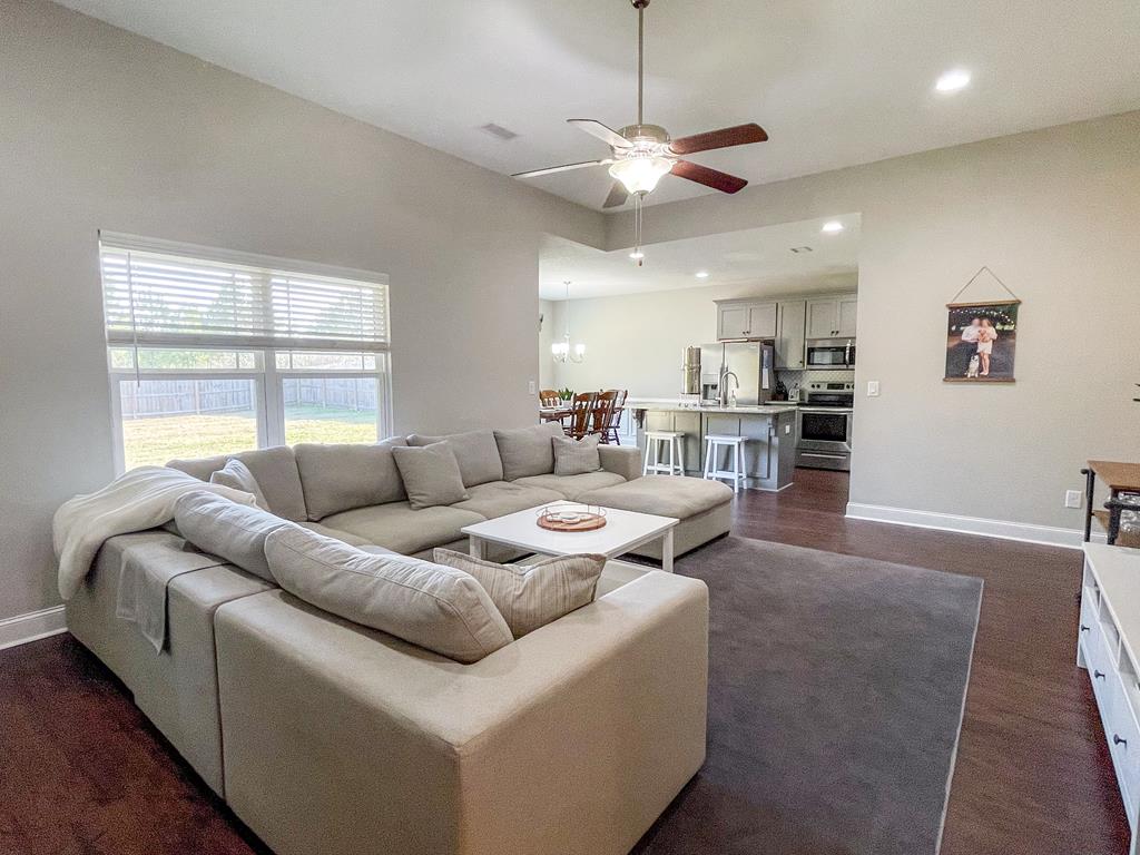 6 Cheyenne Trail Fort Mitchell, AL 36856 - Photo 4 of 33 a living room with furniture and a large window