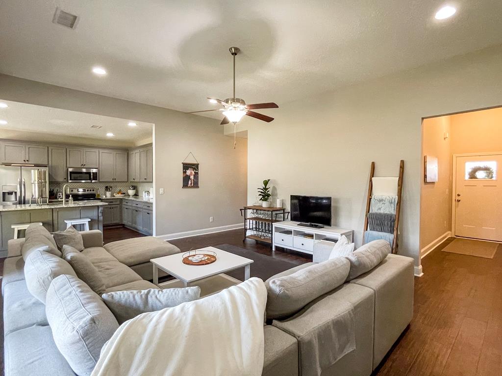 6 Cheyenne Trail Fort Mitchell, AL 36856 - Photo 5 of 33 a living room with furniture and a flat screen tv