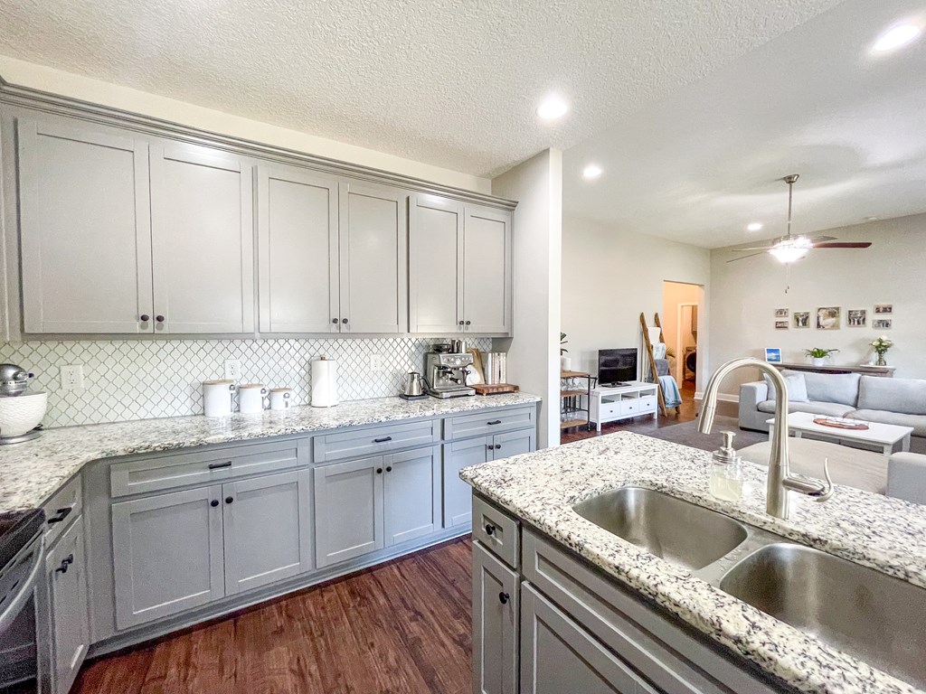6 Cheyenne Trail Fort Mitchell, AL 36856 - Photo 9 of 33 a kitchen with a sink cabinets and window