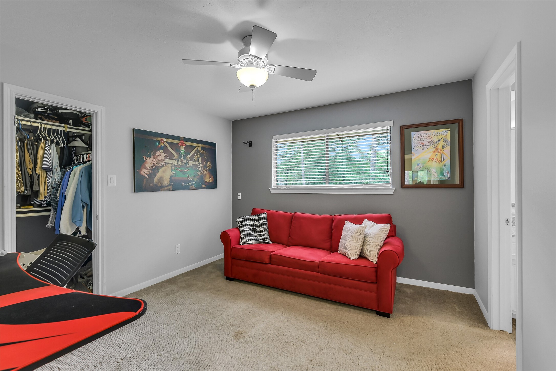 26 Split Rock Road Spring, TX 77381 - Photo 33 of 40 This third bedroom features a large window provides natural light, and there's a closet for storage.