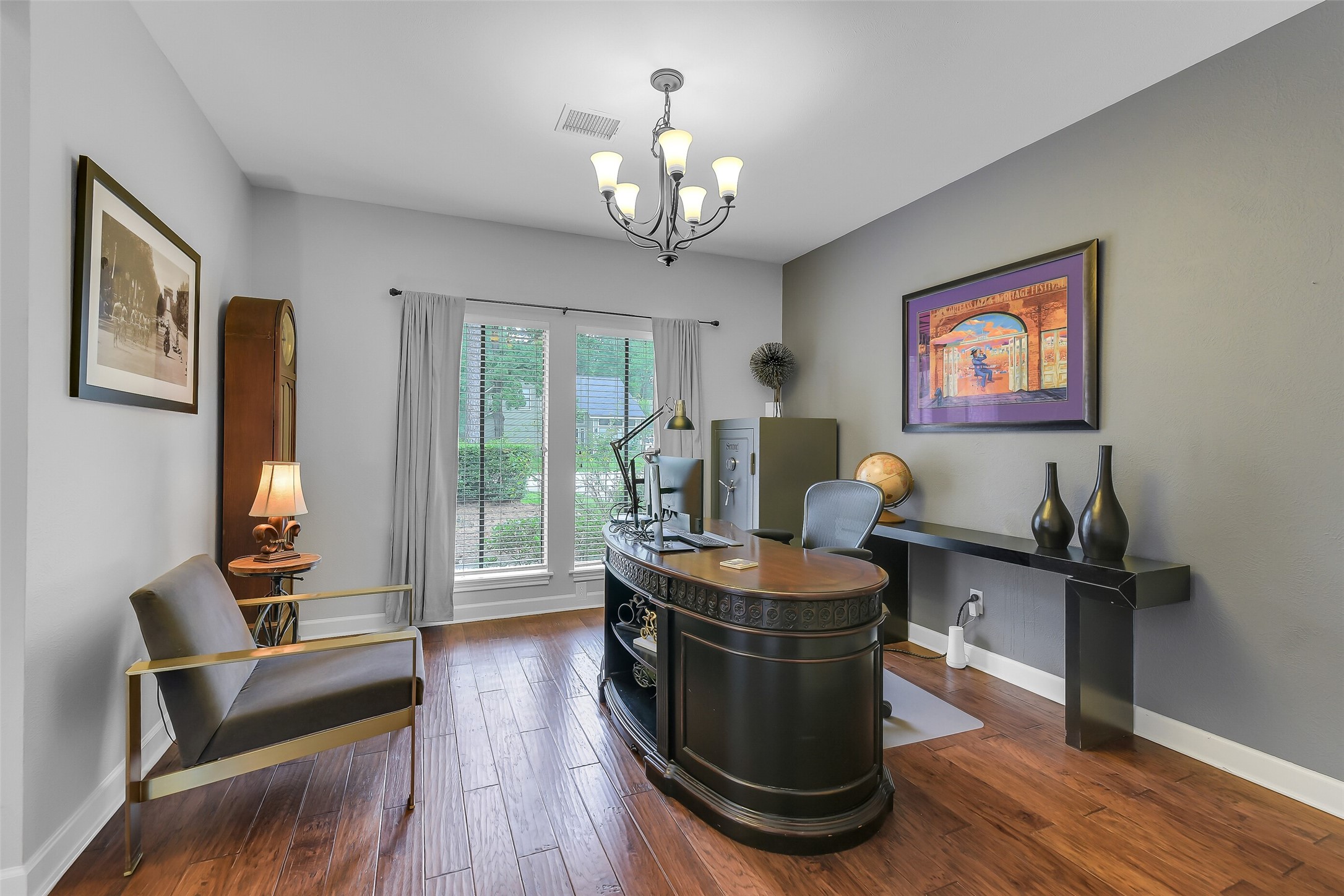 26 Split Rock Road Spring, TX 77381 - Photo 5 of 40 Home office with rich wood flooring and a large window providing natural light.