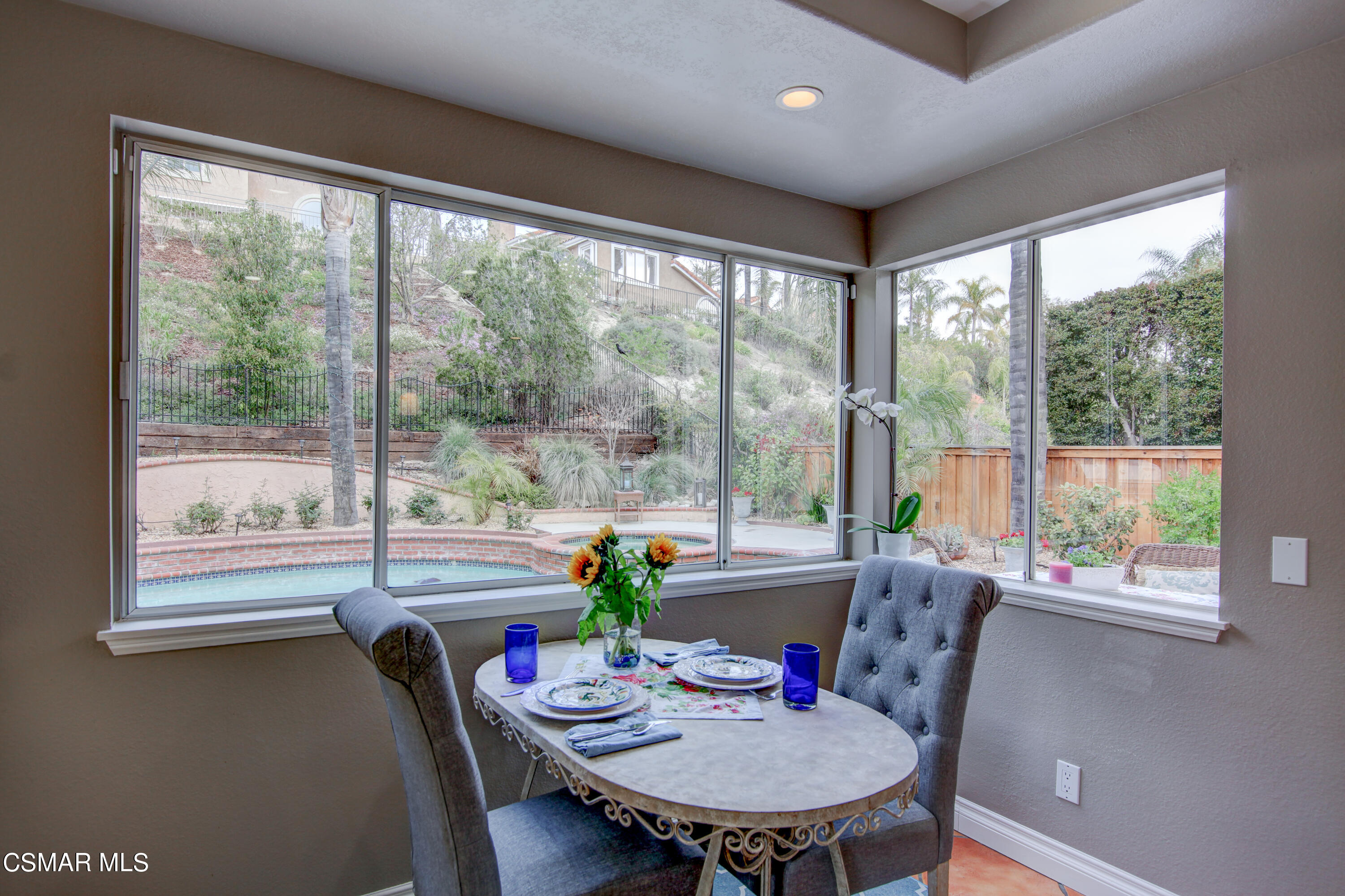 445 Innwood Road Simi Valley, CA 93065 - Photo 19 of 44 a view of a dining room with furniture window and outside view