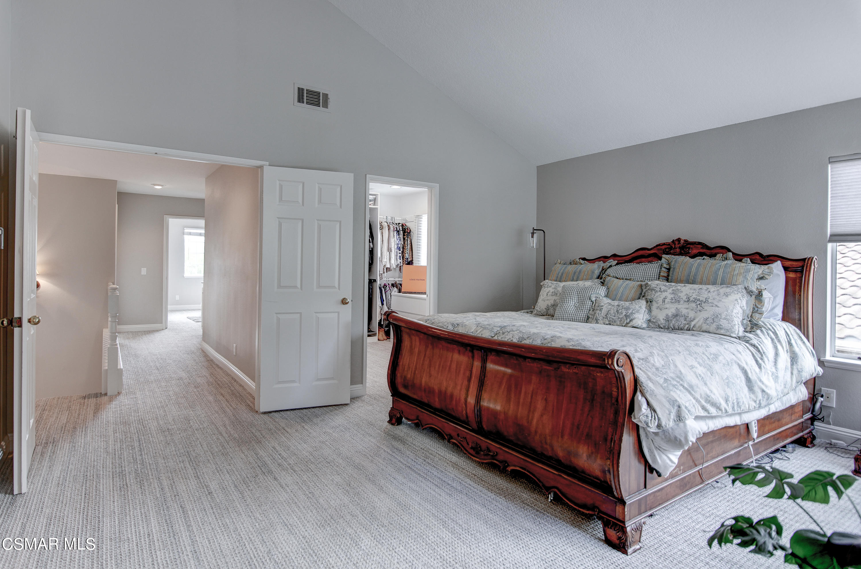 445 Innwood Road Simi Valley, CA 93065 - Photo 22 of 44 a bedroom with a bed and a mirror