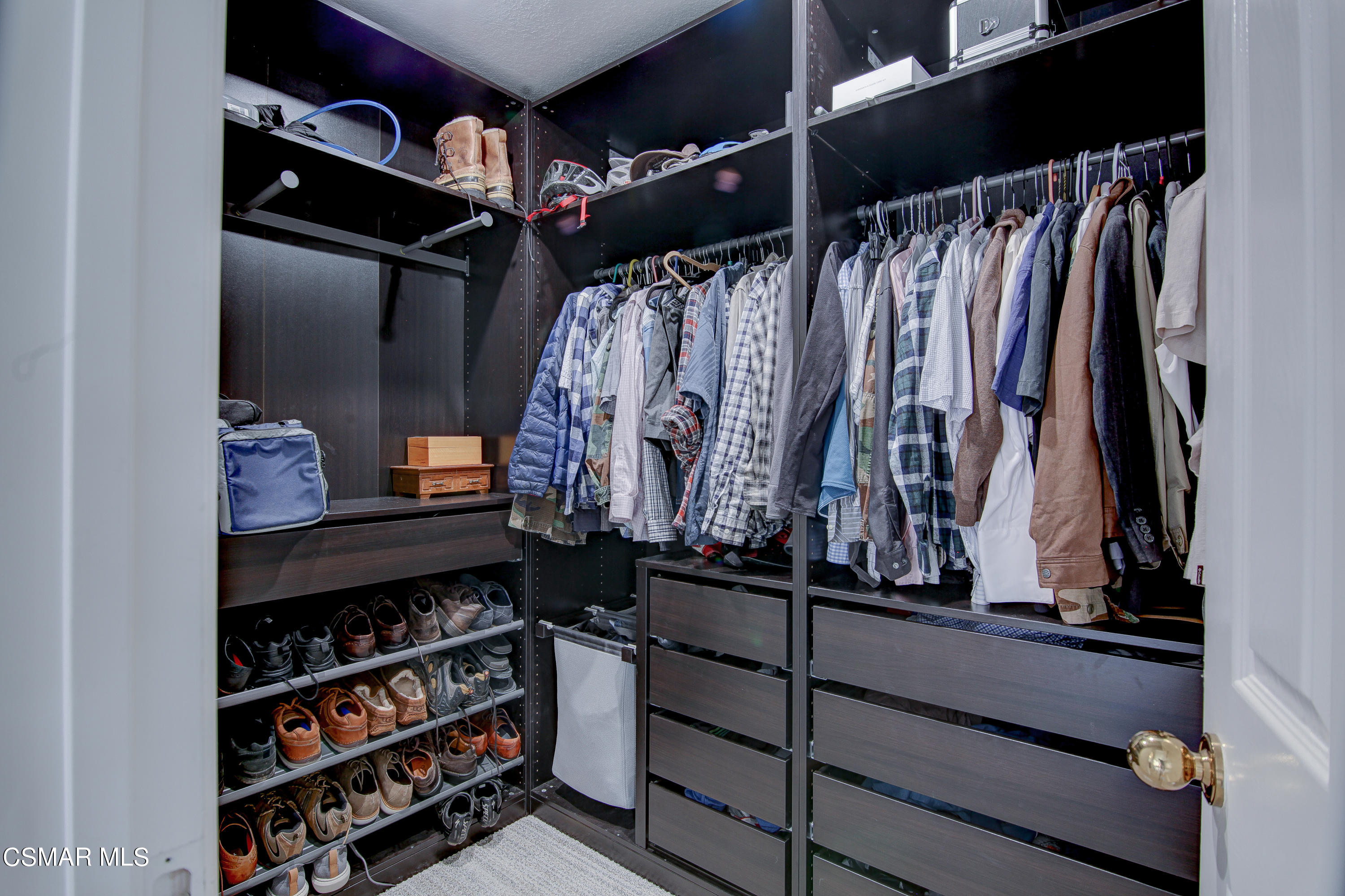 445 Innwood Road Simi Valley, CA 93065 - Photo 29 of 44 a view of walk in closet with clothes and shoes