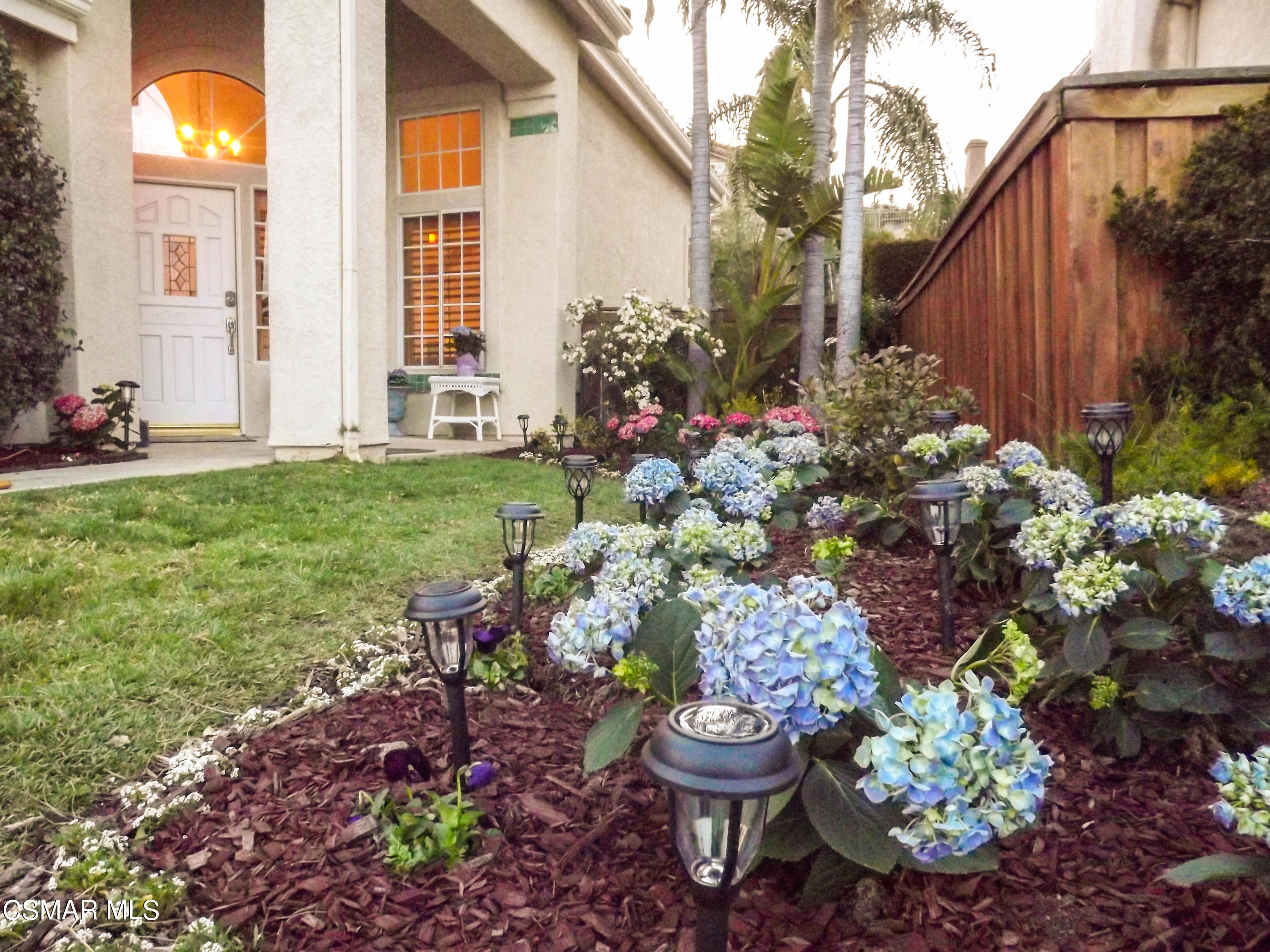 445 Innwood Road Simi Valley, CA 93065 - Photo 39 of 44 a view of a backyard with plants and a garden