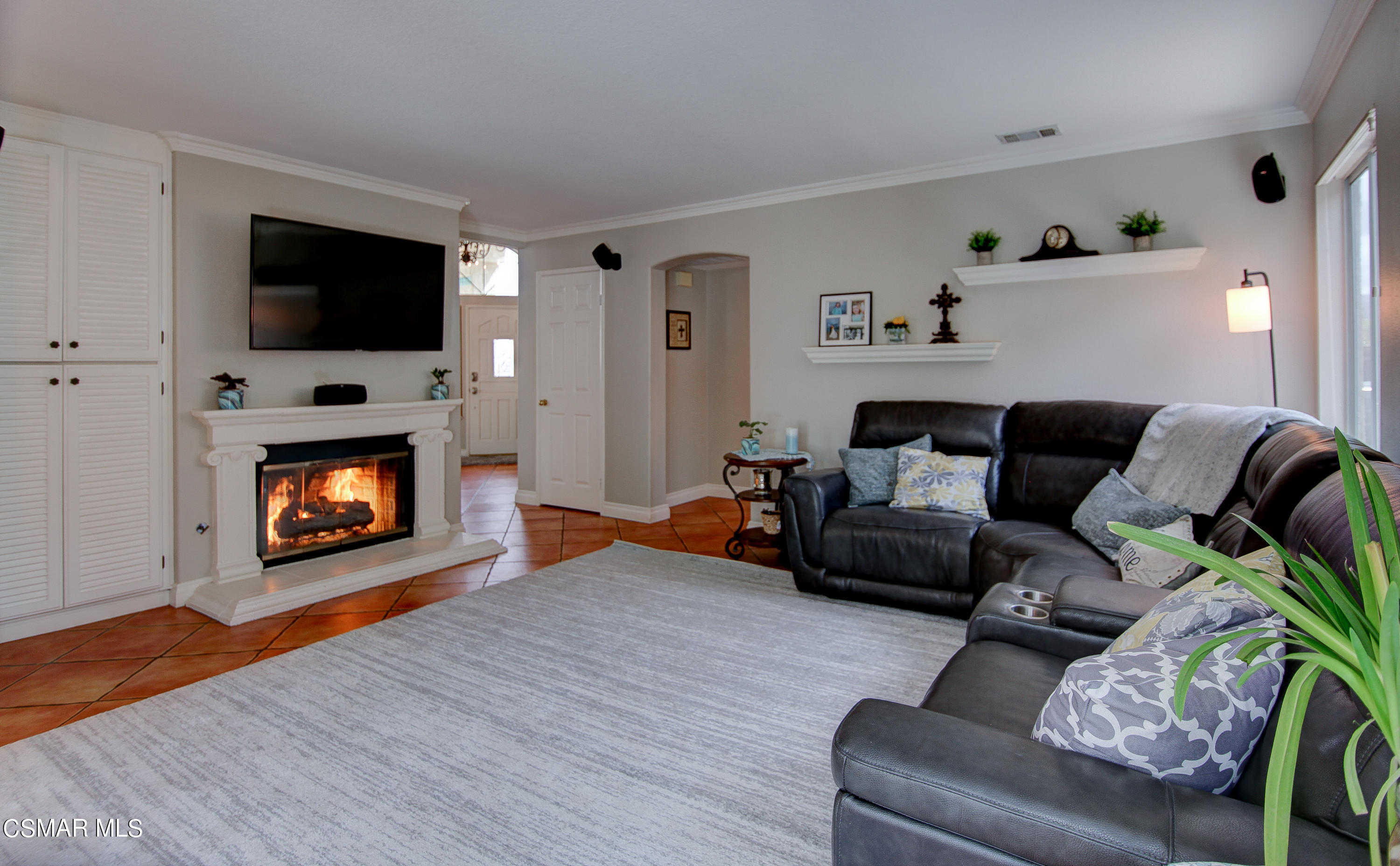 445 Innwood Road Simi Valley, CA 93065 - Photo 5 of 44 a living room with furniture and a flat screen tv
