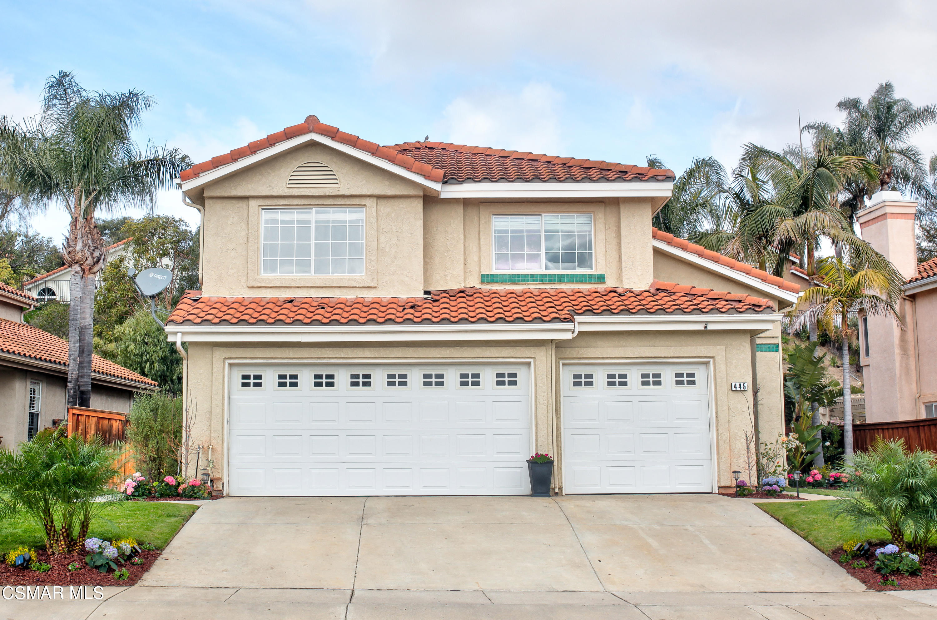 445 Innwood Road Simi Valley, CA 93065 - Photo 41 of 44 a front view of a house with a garage and a fireplace