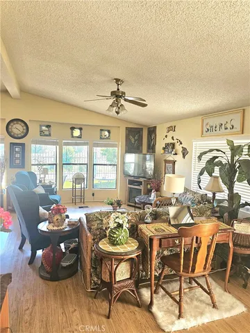 a room with furniture and wooden floor