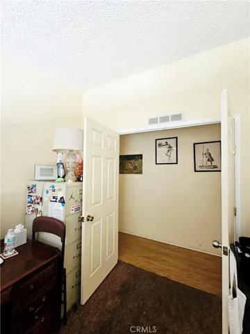 a view of workspace with wooden floor