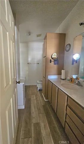 a bathroom with a tub and a window